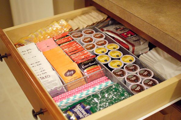 an open drawer filled with snacks and candy