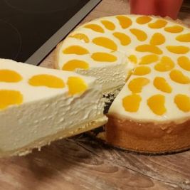 there is a cake with yellow dots on it