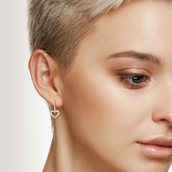 Make a romantic statement of style when you wear these charming freshwater cultured pearl outline heart drop earrings in 14K gold. Created in 14K gold Each drop showcases a classic open heart lined with lustrous freshwater cultured pearls. These earrings secure with lever backs. Elegant Single Heart Cut Earring, Elegant Single Heart Earring For Valentine's Day, Heart-shaped Pearl Earrings For Formal Occasions, Elegant Heart Charm Drop Earrings, Elegant 14k Gold Heart Earrings, Elegant Yellow Gold Heart Earrings For Valentine's Day, Elegant Single Heart Pendant Earring, Elegant Rose Gold Heart Earrings With Charm, Elegant White Gold Open Heart Earrings