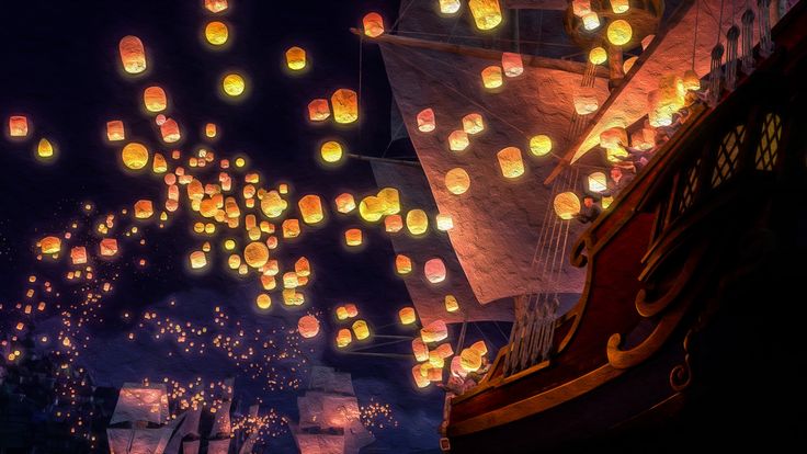 many lanterns are floating in the air above a boat