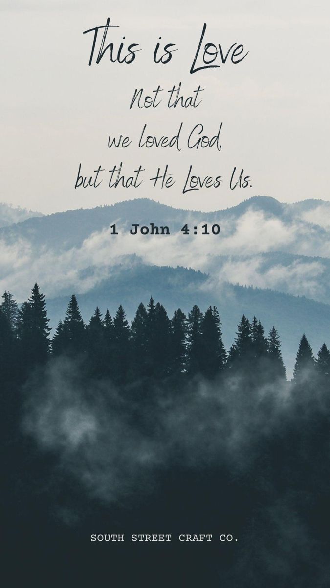 a mountain with trees and clouds in the background that says, this is love net that we loved god but that he loves us