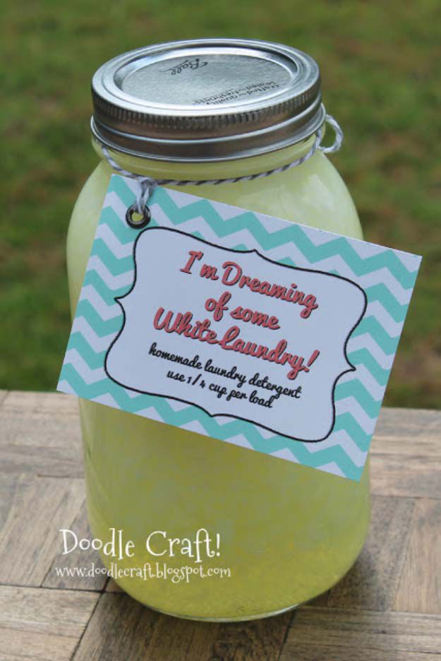 a mason jar filled with lemonade sitting on top of a wooden table