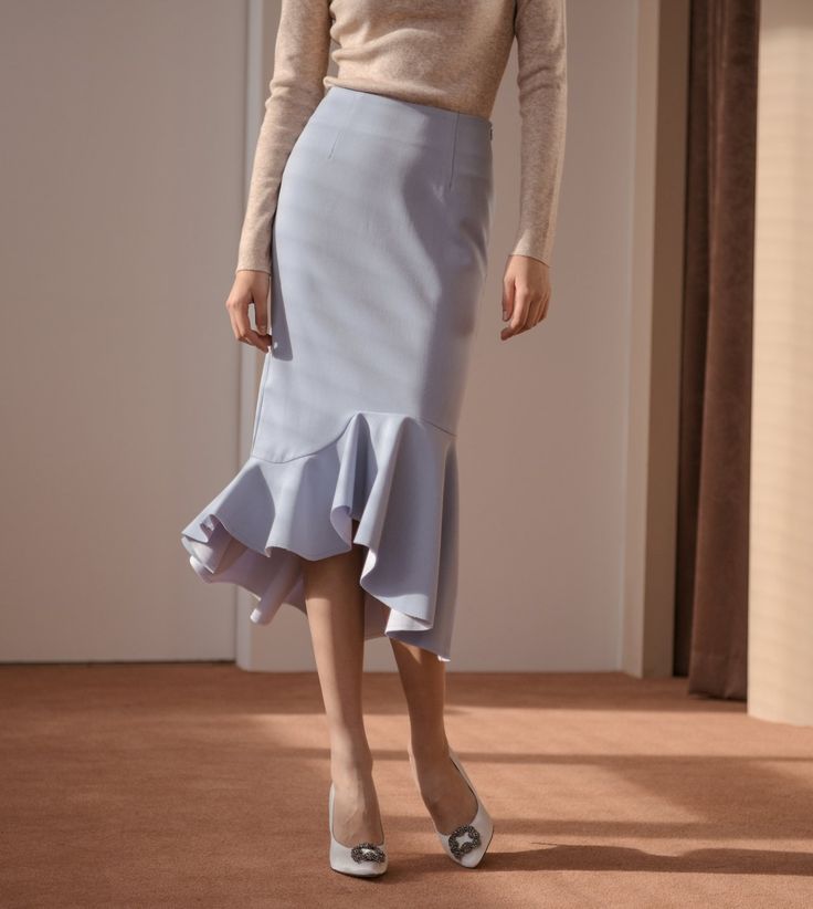 Gorgeous peplum midi skirt cut from high quality stretch twill. Slightly high-waisted for optimal hourglass silhouette. Model is in MINUSEY S. Please allow 5-12 days shipping when in restocking. * MINUSEY S = EU34,US2* MINUSEY M = EU36,US4* 69% Polyester / 28% Rayon / 3% Spandex* Dry clean* Made in Korea - Model Height: 172cm/5'7" (US2, EU34) Chic Midi-length Bottoms With Ruffles, Fitted Ruffled Bottoms Midi Length, Fitted Ruffled Midi Skirt, Elegant Ruffled Blue Bottoms, Elegant Blue Ruffled Bottoms, Fitted Light Blue Bottoms With Ruffles, Elegant Blue Midi Bottoms, Elegant Blue Midi-length Bottoms, Elegant Blue Midi Length Bottoms