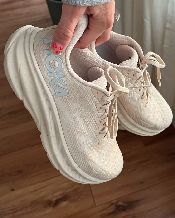 Beige Hoka Shoes, Hokas Women Clifton 8, Hoka Running Shoes Aesthetic, Free People Hokas, Clifton 9 Hoka, Running Shoes Hoka, Shoe Wishlist Women, Hoka Eggnog, Hoka Shoes Aesthetic