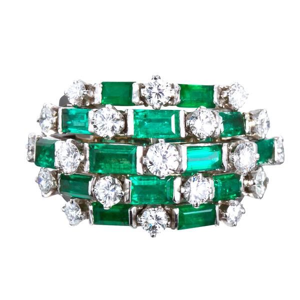 A fine diamond and emerald cocktail ring. Contains 19 round brilliant diamonds and 14 rectangular step cut emeralds set in platinum. Diamonds are ~2.30 ctw. Emeralds are ~3.50 ctw. Currently size 5-1/2 US and complimentary resizing from 3.5 - 8 US. No. 6630 Emerald And Diamond Band, Gemstone Wedding Ring, Round Cut Diamond Ring, Emerald Ring Vintage, Gemstone Wedding Rings, Vintage Jewlery, Platinum Diamond Rings, Green Room, Fine Ring