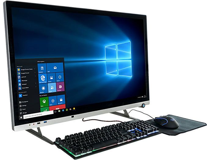 a desktop computer with a keyboard, mouse and windows 10 logo on the monitor screen