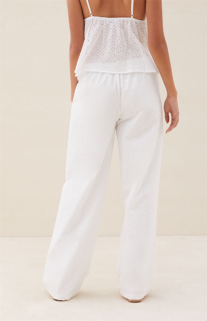 Get ready for sunny days ahead with the Beverly and Beck Eyelet Pants. These pants feature a comfortable drawstring waistline and convenient side pockets. Made from a lightweight cotton with eyelet detailing throughout, they're the perfect combination of style and comfort for the warmer weather. Whether you're strolling on the beach or enjoying a brunch with friends, these pants are a must-have


	Drawstring waistline
	Side pockets
	Lined
	Lightweight
	Floral eyelet design
	10.5" rise
	Mid- Comfortable Cotton Bottoms For Vacation, Cotton Bottoms With Elastic Waistband For Vacation, Comfortable Cotton Summer Sweatpants, Comfortable Cotton Sweatpants For Summer, Relaxed Cotton Bottoms For Vacation, White Cotton Pants For Beach, White Cotton Pants For The Beach, White Cotton Bottoms With Eyelet Details, Relaxed Cotton Pants For Vacation