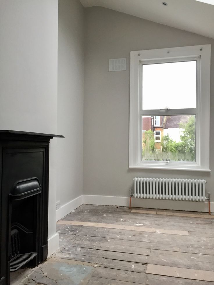 an empty room with white walls and wood flooring is seen on the instagram page