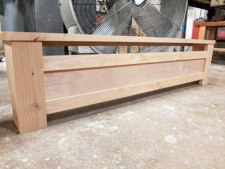 a large fan sitting on top of a wooden table