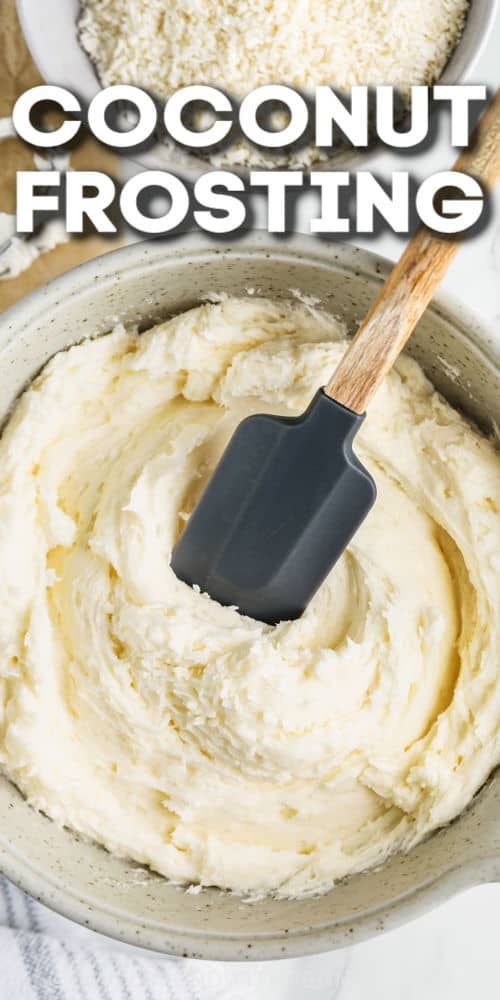 a bowl filled with coconut frosting and a spatula in the top right hand corner