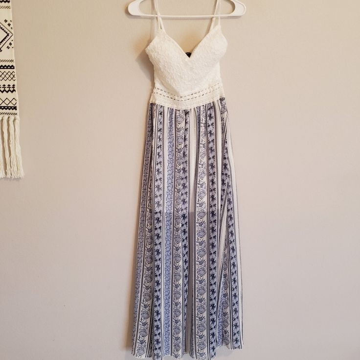 Blue/White Maxi Dress There Was A Tiny Tear That I Had To Hand Sew. White Lace Sundress Maxi Dress, White Maxi Crochet Dress For Day Out, White Sleeveless Crochet Lace Maxi Dress, White Maxi Dress With Crochet Trim, White Crochet Trim Maxi Dress, Blue Crochet Maxi Dress For Summer, White Fitted Maxi Dress With Crochet Trim, Blue Crochet Lace Dress For Spring, Blue Lace Crochet Beach Dress