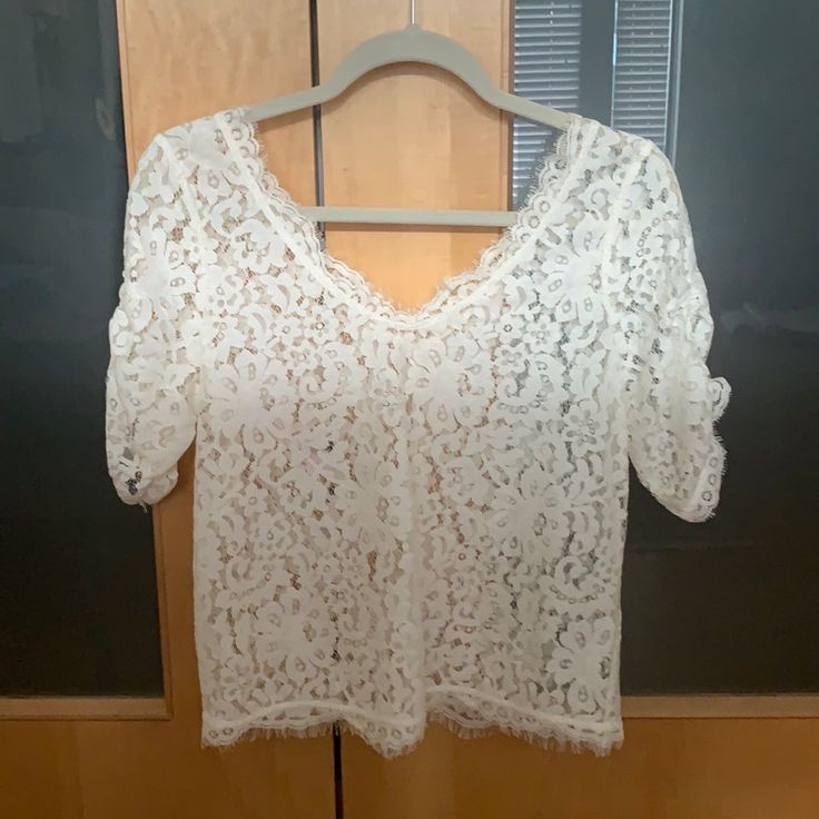 -Size Xs -White/Cream -Never Worn Feminine White V-neck Lace Top, White Lace Top For Day Out, White Feminine Lace Top For Day Out, Feminine White Lace Top For Day Out, Chic White Lace Top For Day Out, White Fitted Lace Top With V-neck, Elegant White Lace Top For Day Out, Casual White Lace Top For Brunch, White Feminine Lace Top For Brunch