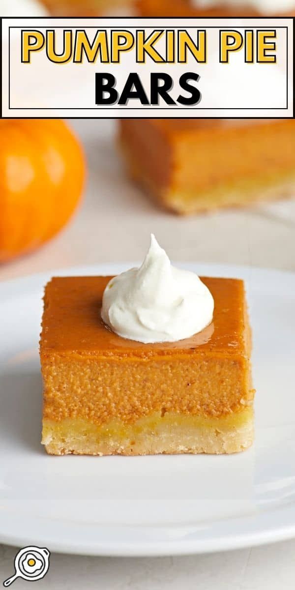 pumpkin pie bars on a white plate with whipped cream in the middle and an orange background