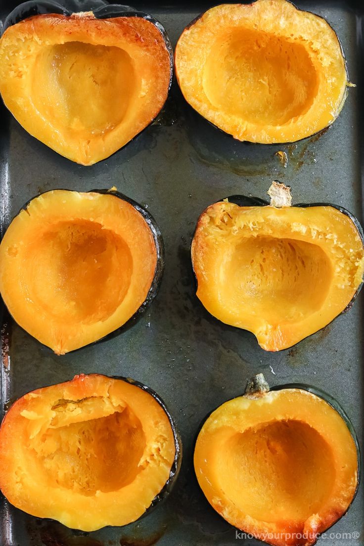 how to roast acorn squash on a baking sheet with text overlay that reads, how to roast acorn squash