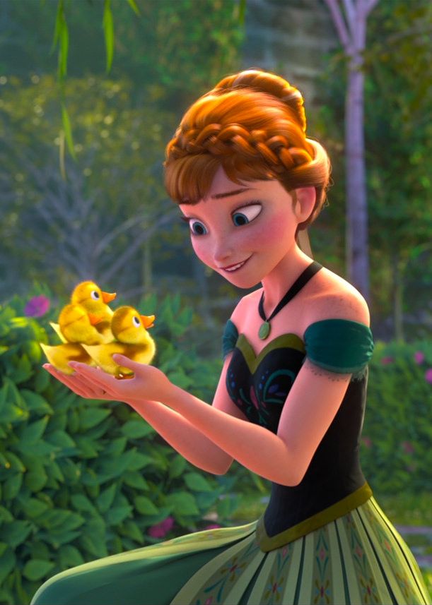 the princess is holding two little ducks in her hand