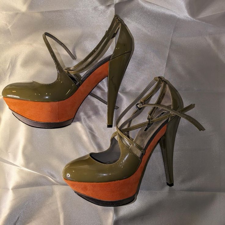 Stiletto Platform Sandal. Olive Patent Upper And Suede Platform. Size 8.5. Like New. 4 Inch Heel. New, Never Worn. No Tags Or Box. Orange Platform Heels With Round Toe, Orange Platform Heels With Closed Toe, Orange High Heel Platform Shoes, Orange Platform Heels With High Heel, Orange Platform High Heels, Chic Orange Closed Toe Heels, Orange Sandals With 4-inch Heel And Round Toe, Orange Platform Sandals For Evening, Orange Heels With Padded Heel And Round Toe