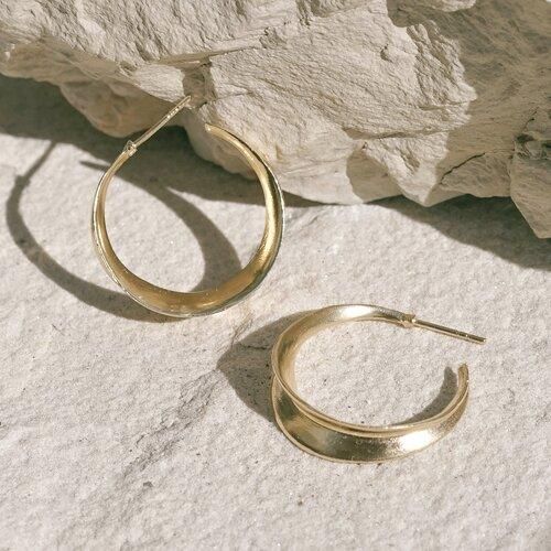 From our friends at Mountainside: Carved minimal inverted light weight hoop stud earrings. A unique take on a classic style. Earrings are available in recycled brass coated in a thick layer of high grade 14k gold. Includes silicone earring backs which we’ve found to be most comfortable and secure and best suited to this style of earring. Made in the U.S.A. Modern Brass Hoop Earrings For Anniversary, Modern Hand Forged Hoop Earrings For Gift, Gold Recycled Hoop Earrings For Anniversary, 14k Gold Hand Forged Hoop Earrings For Gift, Timeless Brass Hoop Earrings As Gift, Timeless Metal Hoop Earrings As Gift, Timeless Brass Hoop Earrings For Gift, Minimalist Brass Hoop Earrings For Anniversary, Elegant Hand Forged Hoop Earrings For Everyday