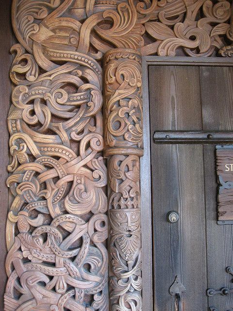 an intricately carved wooden door is shown