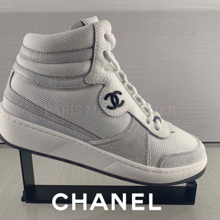 Chanel Icon 2022 Ss Sneakers. High Top White Cc Sneaker. Sold Out Everywhere. Sz 38.5 Fits Like 8.5-9. I’m Normally A Sz 9 And They Fit Perfectly. Worn Just A Few Times, Great Condition. No Scuffs/Defects. Includes Box And Dust Bags. Luxury High-top Sneakers With Round Toe For Sports, Luxury High-top Sports Sneakers, Designer High-top Sneakers With Round Toe For Sports, Designer Round Toe High-top Sneakers For Sports, Casual High-top Sneakers With Branded Heel, Luxury High-top Sneakers With Branded Insole, Sporty Medium Fit High-top Sneakers With Round Toe, Sporty Custom Sneakers With Branded Heel Counter, Luxury High-top Sneakers Medium Fit