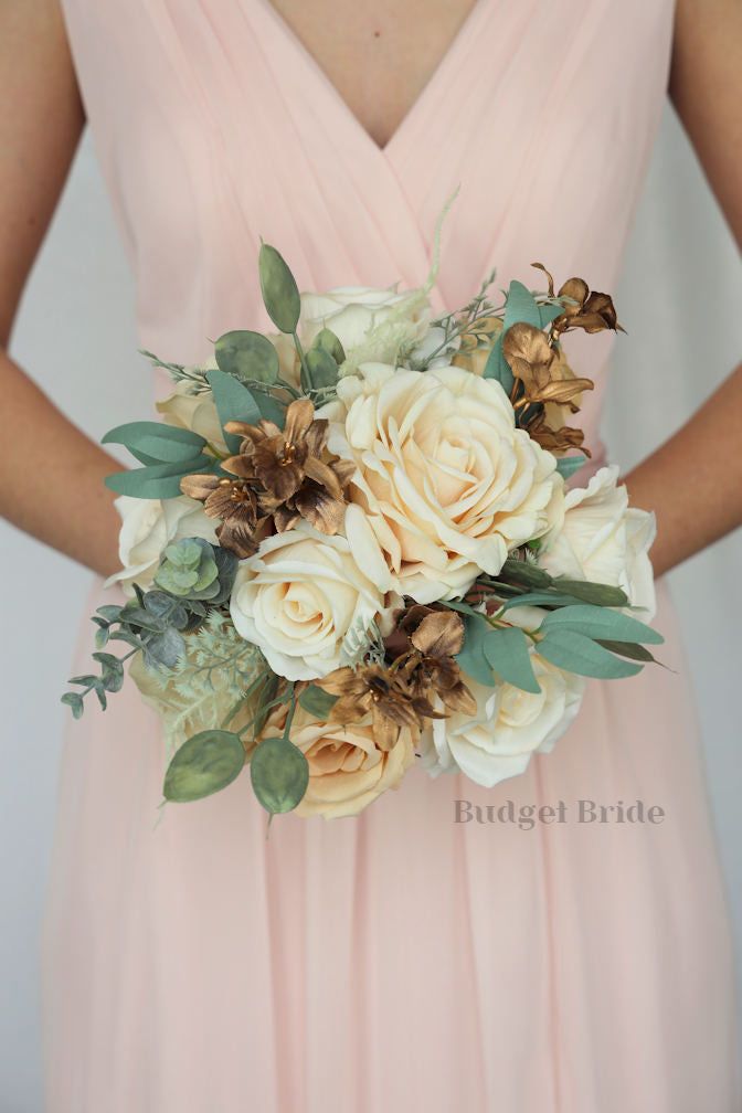 a woman in a pink dress holding a bridal bouquet