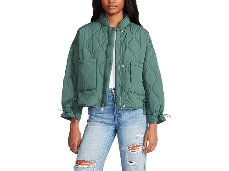 Steve Madden Stefani Jacket - Women's Clothing : Deep Green : Get the casual piece for layering on fall by adding Steve Madden Stefani Jacket. Relaxed fit. Mock neck. Zip-snap front closure. Cinch long sleeves. Patch pockets. Quilted lightweight nylon jacket. 100% polyester. Hand wash cold separately, do not bleach, lay flat to dry, low iron if necessary, or dry clean. Imported. Utility Windbreaker With Stand Collar For Fall, Utility Stand Collar Windbreaker For Fall, Trendy Windbreaker For Cold Weather With Pockets, Trendy Windbreaker With Pockets For Cold Weather, Fall Utility Long Sleeve Windbreaker, Utility Long Sleeve Windbreaker For Fall, Casual Spring Puffer Windbreaker, Fall Long Sleeve Puffer Windbreaker, Versatile Nylon Outerwear For Fall