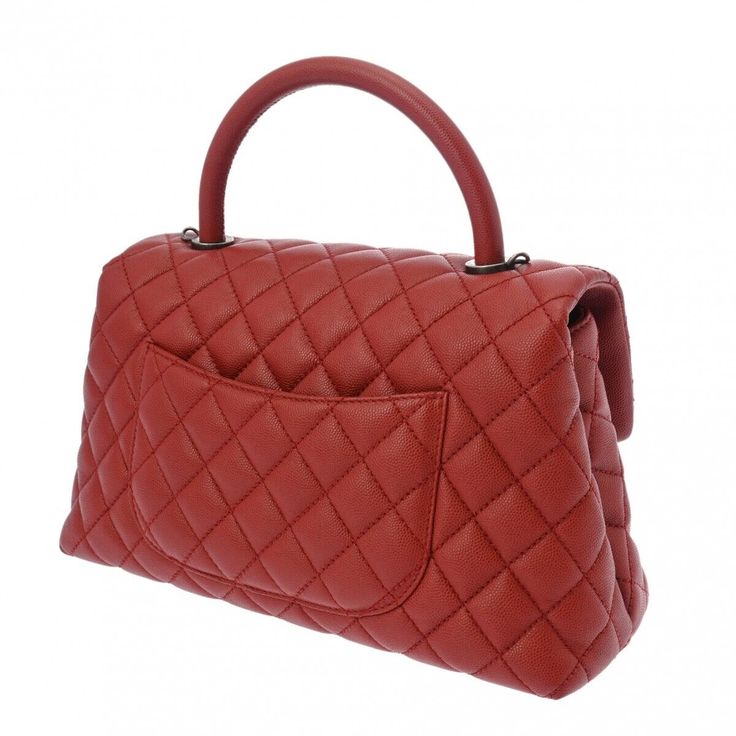 Introducing the Chanel Matrasse Top Handle 29 2Way Red Hand Bag, a timeless piece that effortlessly combines elegance and functionality. Crafted from high-quality red leather and featuring the iconic matrasse stitching, this bag exudes luxury and sophistication. The versatile design allows you to carry it by the top handle for a chic look or use the detachable strap for a more casual vibe.The spacious interior of the Chanel Matrasse Hand Bag provides ample room for all your essentials, making it Classic Quilted Bags For Formal Occasions, Classic Quilted Formal Bags, High-end Top Handle Bag With Cc Turnlock Closure, Classic Quilted Flap Bag For Formal Occasions, High-end Quilted Bags For Formal Occasions, Classic Quilted Shoulder Bag For Business, High-end Quilted Formal Bag, Classic Quilted Shoulder Bag, High-end Formal Quilted Bags