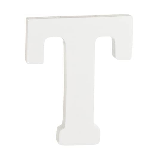 a white plastic letter t on a white background