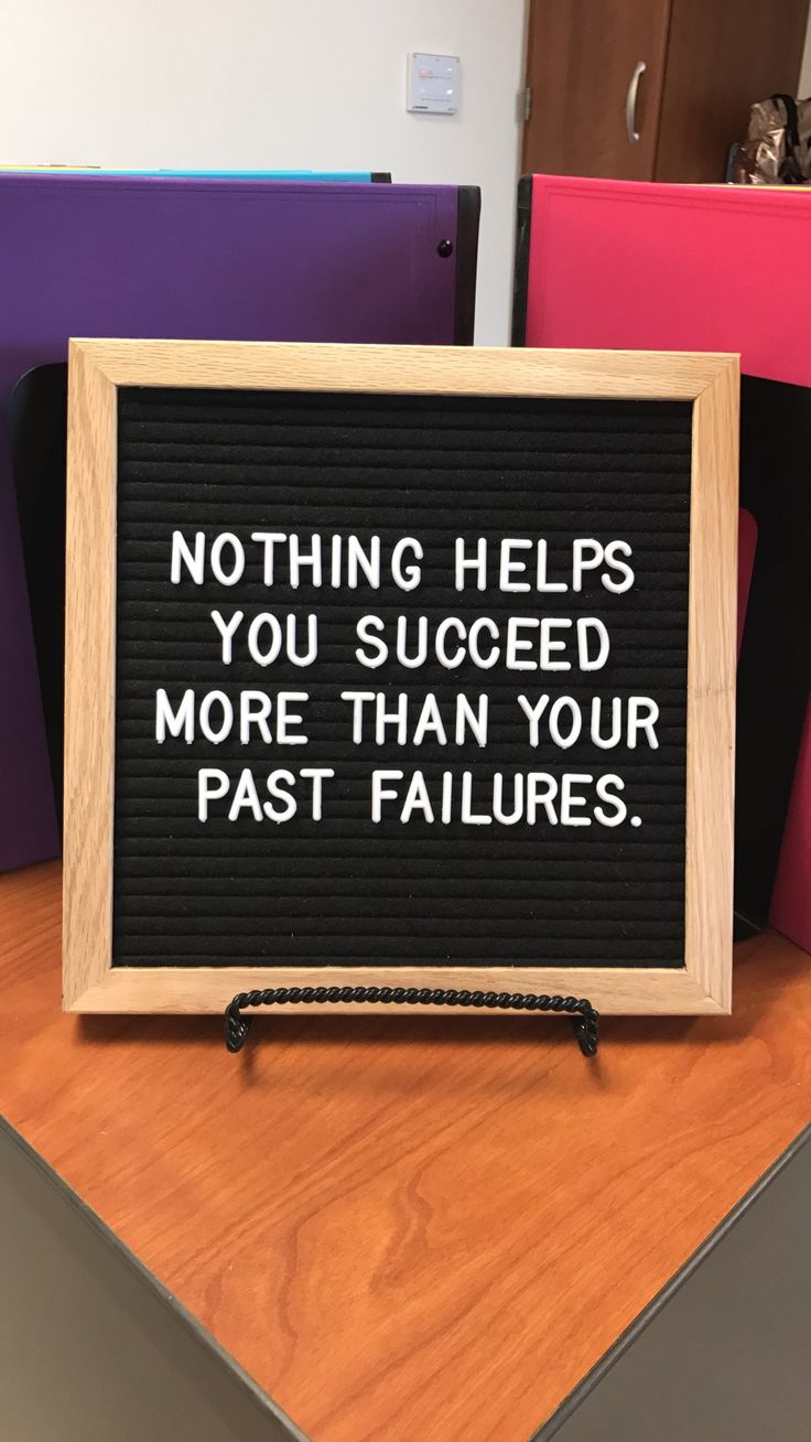 a sign that says nothing helps you succeed more than your past failures