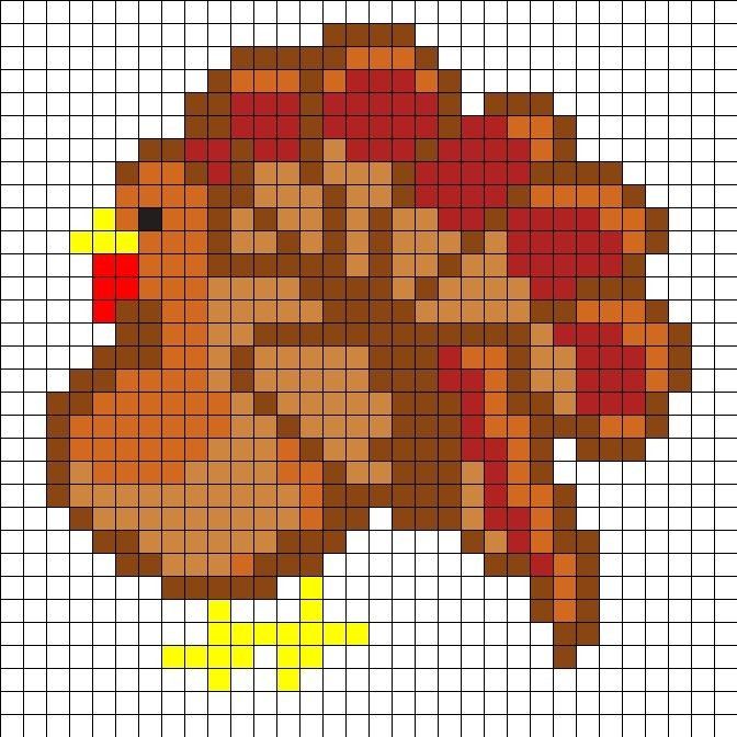 a cross - stitch pattern of a turkey wearing a red and yellow headdress