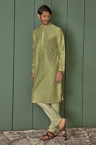 Olive green chanderi kurta with all over floral jaal pattern and tonal resham embroidery. Paired with contrast pyjama. - Aza Fashions Transitional Green Chanderi Bandhgala, Traditional Green Silk Sherwani, Green Chanderi Sherwani With Traditional Drape, Designer Green Banarasi Silk Kurta, Pista Green Raw Silk Kurta For Transitional Season, Green Chanderi Bandhgala For Transitional Season, Green Cotton Silk Sherwani For Diwali, Transitional Pista Green Raw Silk Kurta, Green Chanderi Bandhgala With Cutdana