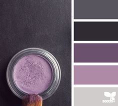 a purple and black color palette with a brush