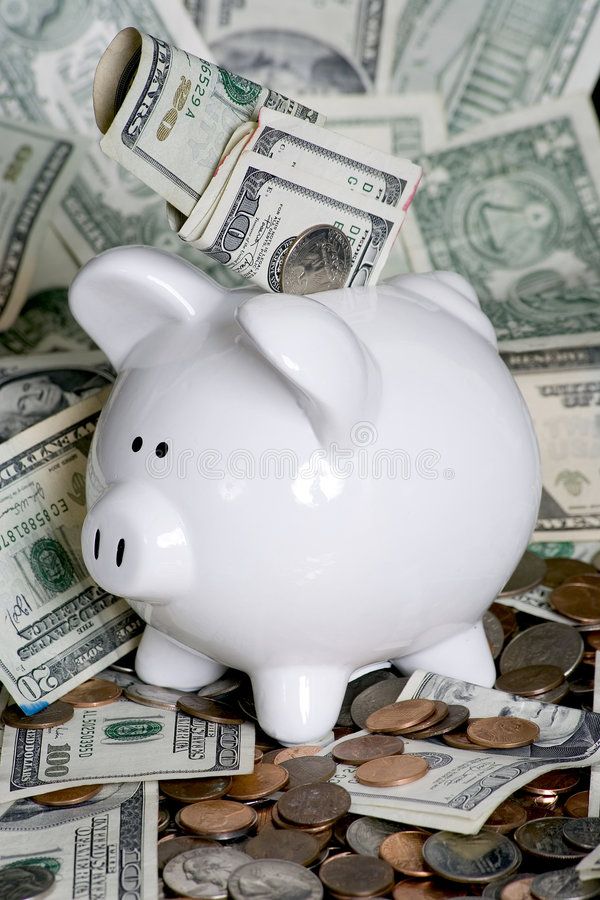 a piggy bank with money falling out of it royalty images and stock photos for commercial use