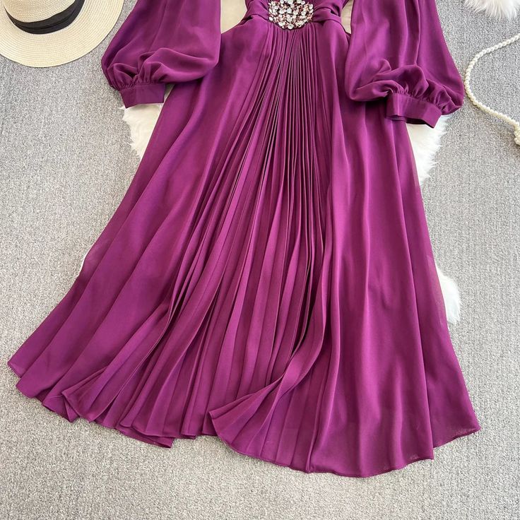 DETAILS: Please refer size chart before choosing Beautiful pleated details with stone embellishments. Perfect for a party or special occasion. A-line silhouette Long lantern sleeve Ankle length for 5'5" height Not fully lined. SIZE CHART: Size M- US(10)-Bust: 40.5" Waist: 31.5" Length: 51.5" Sleeve: 24" Shoulder: 14.5" Size L-US(14)-Bust: 42.5" Waist: 33" Length: 52" Sleeve: 24" Shoulder: 14.5" Size XL-US(16)-Bust: 44" Waist: 34.5" Length: 52.5" Sleeve: 25" Shoulder: 15" Size 2XL-US(18)- Bust: 4 Cocktail Long Sleeve Pleated Dress With Pleated Sleeves, Elegant Long Sleeve Pleated Dress For Cocktail Occasions, Elegant Long Sleeve Pleated Cocktail Dress, Elegant Chiffon A-line Pleated Dress, Evening Pleated Dress With Long Sleeves, Long Sleeve Pleated Cocktail Dress, Elegant Midi Dress With Pleated Sleeves For Party, Fitted Pleated Dress With Pleated Sleeves For Party, Elegant Party Midi Dress With Pleated Sleeves