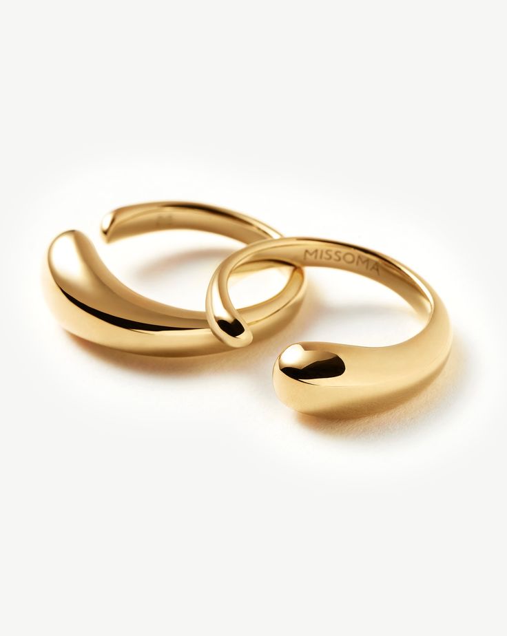 Molten Double Stacking Ring Set | 18ct Gold Plated. Make It Molten. This Organic-Inspired Ring Set Features Two Sculptural Bands that Fit Together to Create One Statement Ring. Style Separately or Stack Together. Metal: 18Ct Recycled Gold Plating on Brass Dimensions: 13. 7Mmx 5. 5mm Weight: 6. 6g Product Code: Or-G-R2-Ns Luxury Yellow Gold Plated Ring, 14k Gold Plated Rings For Anniversary, 14k Gold Plated Rings, 14k Gold Plated Yellow Gold Rings, 14k Gold-plated Yellow Gold Rings, Yellow Gold Sterling Silver Stackable Rings With Polished Finish, Yellow Gold Polished Sterling Silver Stackable Rings, Elegant Gold Couple Rings With Open Band, Elegant Gold Open Band Couple Rings