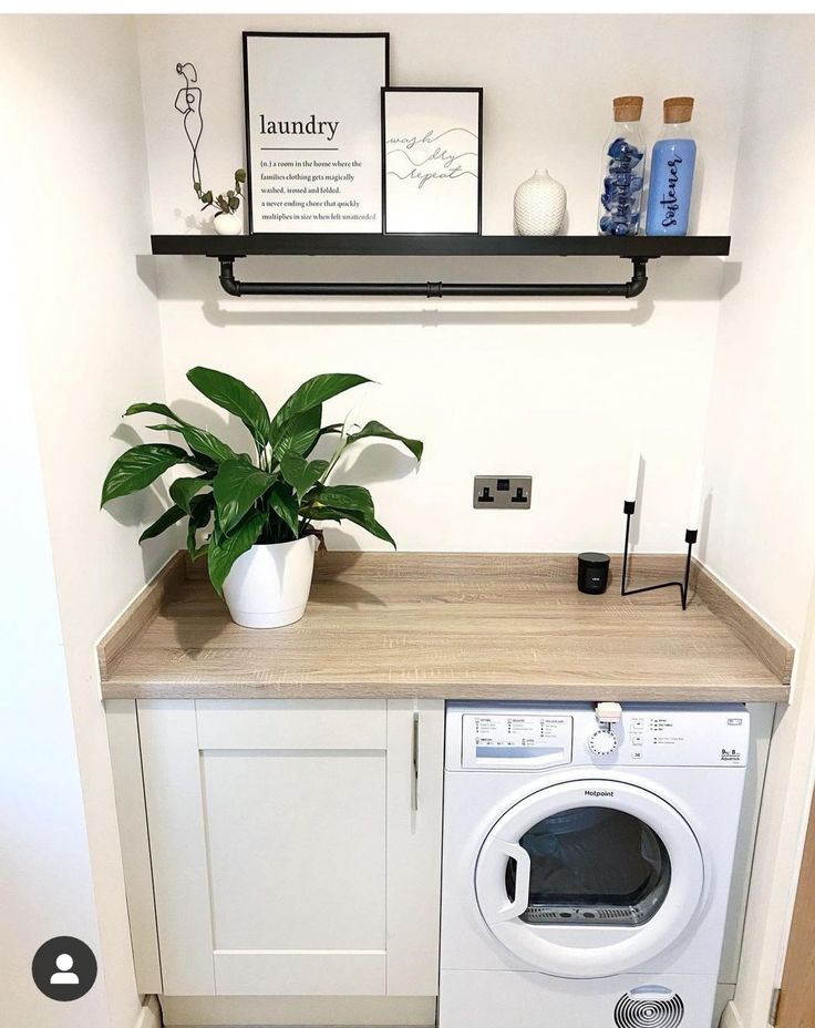 a washer and dryer in a small room