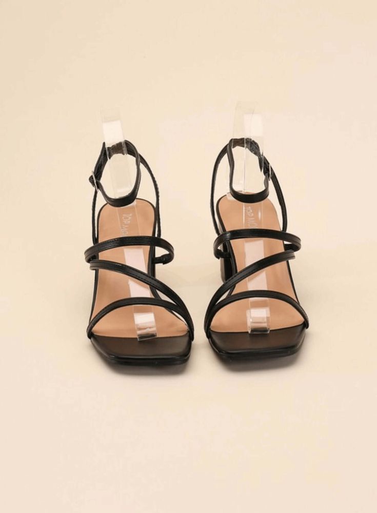 These low heels add a cool, modern edge to any outfit. With a square, open toe and a stylish block heel, these versatile sandals are a must-have for your summer wardrobe. The elegant strappy look will instantly elevate any look. Type: Sandals Pattern type: Solid Style: Chic Toe: Square, open toe Heel height: Mid heels Heel shape: Block heels Material: Synthetic Imported Heels With Long Dress, Chic Low Heel T-strap Sandals For Party, Chic T-strap Sandals With Low Heel For Party, Sleek Sandals With 4-inch Heel And Ankle Strap, Black Low Heel T-strap Sandals, Modern Black Sandals With 4-inch Heel, Sandals Patterns, Low Heel Sandals, Black Sandals Heels