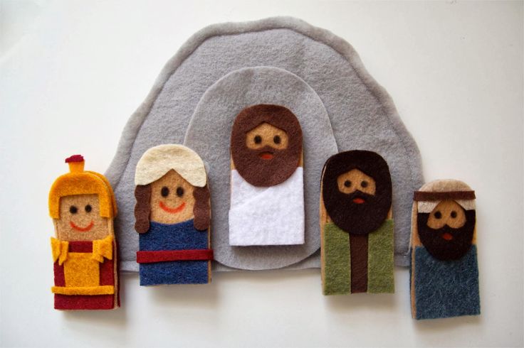 felt nativity scene displayed on white surface