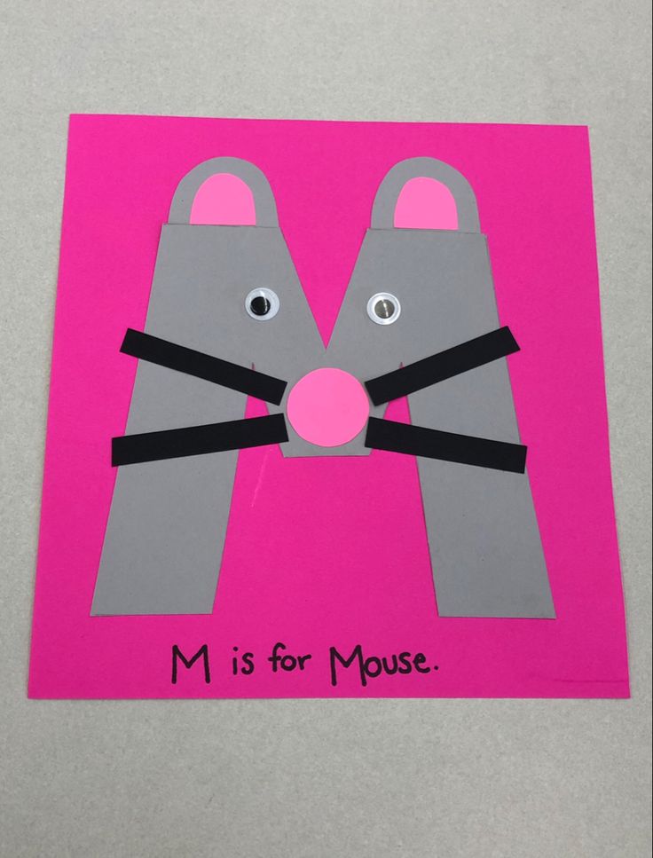 a paper cut out of a mouse with the words m is for mouse on it