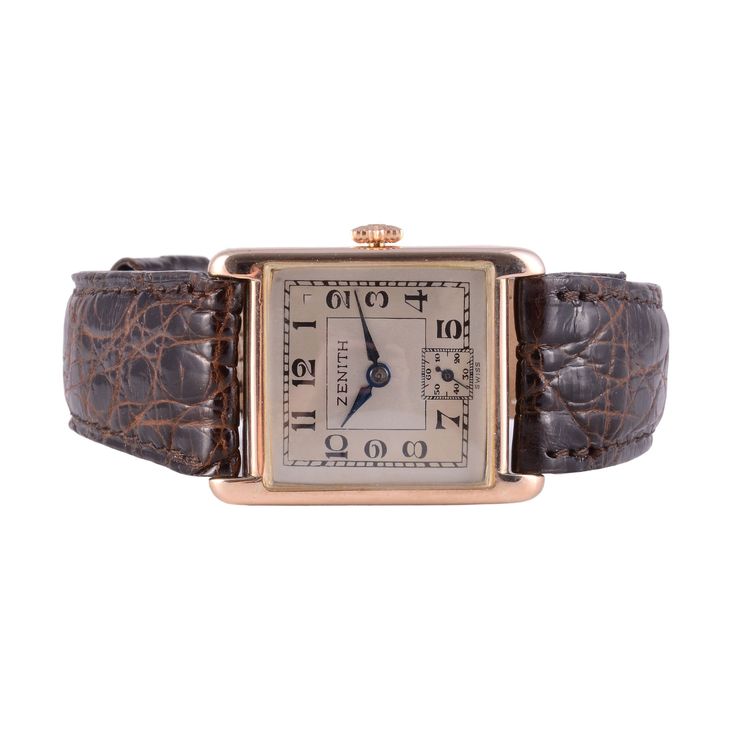 Vintage Swiss Zenith Art Deco mens rose gold wrist watch, circa 1930. This 9 karat rose gold square case wrist watch features a restored original silver dial and enamel numerals. The Zenith Art Deco watch has a 17 jewel movement. Case #75834, 9-1/2 ligne. [SSHO 412] Warranty This watch comes with a full 18 month warranty from the date of purchase. Classic Square Watch For Formal Occasions, Classic Square Formal Watches, Classic Square Watches For Formal Occasions, Antique Rectangular Watch Band For Formal Occasions, Timeless Rectangular Rose Gold Watch, Timeless Rose Gold Rectangular Watch, Vintage Rectangular Watch With Subdials, Art Deco Rectangular Watch With Diamond Hour Markers, Art Deco Rectangular Watch With Diamond Markers