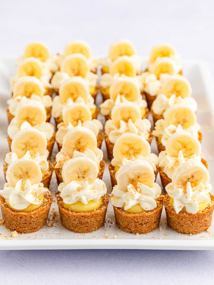 there are many small cupcakes with bananas on them