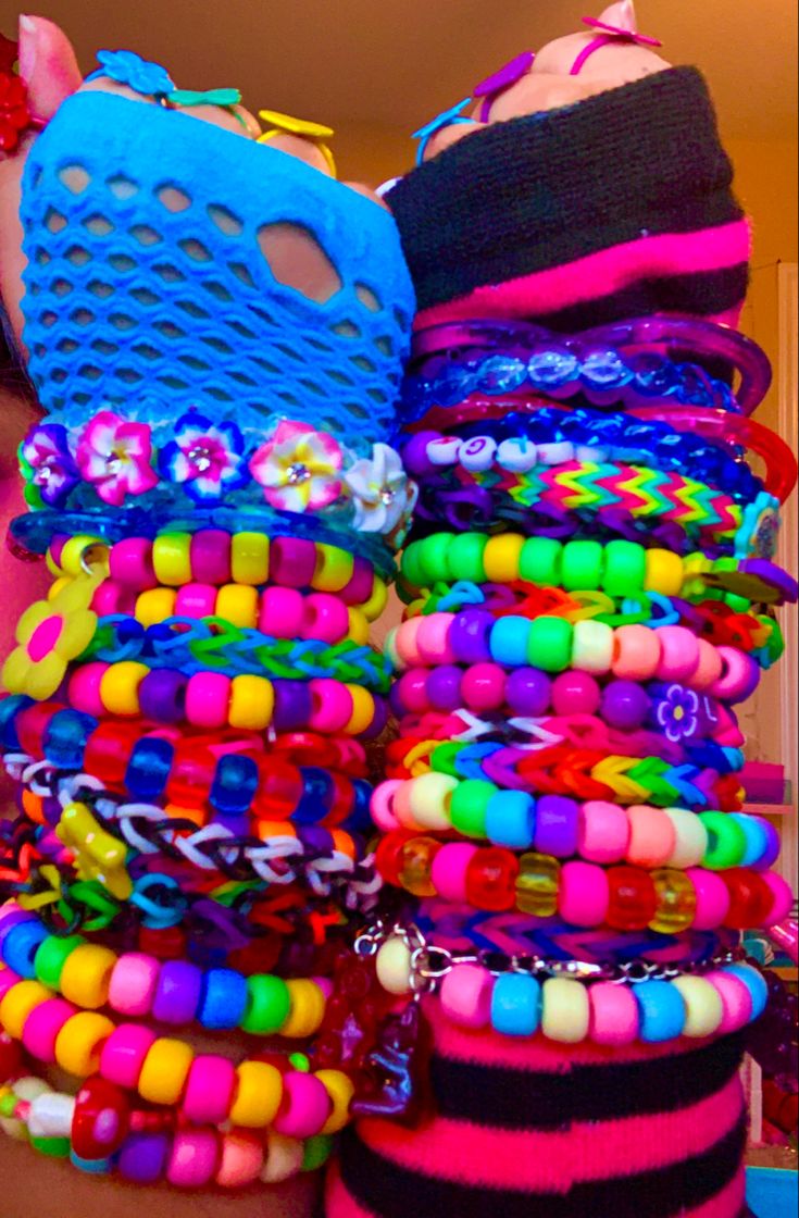 This is only like, half of my bracelets. I made 95% of these. #kidcore #bracelet #beadbracelets Kidcore Bracelet, Indie Bracelets, Scene Kandi, Diy Kandi Bracelets, Pony Bead Bracelets, Diy Kandi, Kidcore Aesthetic, Kandi Kid, Kandi Patterns