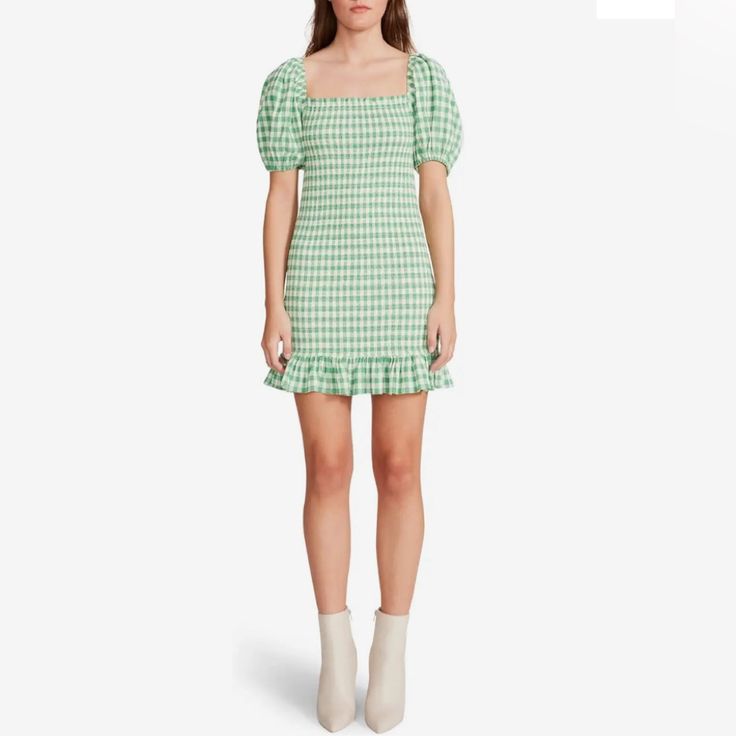 Explore Your Day With A Chic And An Elegant Look Wearing The Bb Dakota X Steve Madden Picnic Vibes Dress. Mini Length Dress With Allover Cute Gingham Pattern. Square Neckline And Short Puff Sleeves. Smocked Pattern Throughout. Ruffled Detailing On The Hem. Pull-On Construction. 80% Polyester, 20% Rayon. Hand Wash, Dry Flat Or Dry-Clean. Green Summer Mini Dress For Picnic, Flirty Spring Dresses For Picnic, Flirty Spring Picnic Dresses, Chic Green Mini Dress For Picnic, Green Mini Dress With Ruffle Hem, Casual Green Mini Dress For Picnic, Casual Summer Mini Dress For Picnic, Flirty Summer Mini Dress For Picnic, Flirty Mini Dress For Summer Picnic