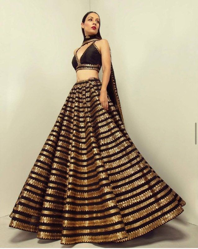 "✦We provide high quality Indian Ethnic wear for women. We house a wide range of collections of dresses, which include the designer lehenga choli ,bridesmaid lehenga choli,festival lehenga choli,latest gowns, party wear Lehenga Choli,indian wedding lehengas,ready made lehenga,sabiyasachi lehengas,bollywood designer outfits and many more. 👉Lehenga choli Detail Lehenga (Semi-Stitched) Fabric:Heavy Kasturi silk Work:sequence & dori work ( 3 meter flair ) Flair : 3 mtr Size : waist-44\" Length- Golden Lehenga, Sequence Lehenga, Black Lehenga Choli, Dori Work, Blouse Lehenga, Indian Wedding Lehenga, Bridesmaid Lehenga, Sabyasachi Lehenga, Saree Bollywood