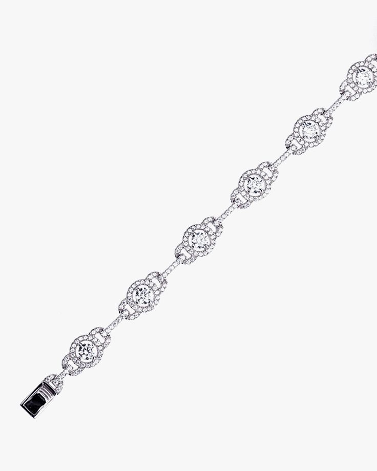 - Halo and Link Bracelet with sterling silver- Made in Sterling silver set with a high-quality Cubic Zirconia. - Stone size: 4.00 mm, 1.10 mm- Length: 7 inch Sterling silver925 Sterling Silver is an alloy made of 92.5% pure silver and 7.5% copper. We plate our silver jewelry in rhodium, which gives it extra shine and durability. Rhodium is one of the costliest precious metals due to its rarity.CareH2O sensitive. Avoid water when wearing your piece, because over time the sterling silver will oxid Round Cubic Zirconia Diamond Bracelet With Polished Finish, Round Cubic Zirconia Diamond Bracelet, Silver Cubic Zirconia Bracelets With Diamond Cut, Silver Brilliant Cut Diamond Bracelet In Platinum, Silver Platinum Diamond Bracelet With Brilliant Cut, Classic White Gold Crystal Bracelet With Cubic Zirconia, Sterling Silver Tennis Bracelet With Diamond Accents, Classic White Gold Cubic Zirconia Crystal Bracelet, Classic Silver Cubic Zirconia Tennis Bracelet