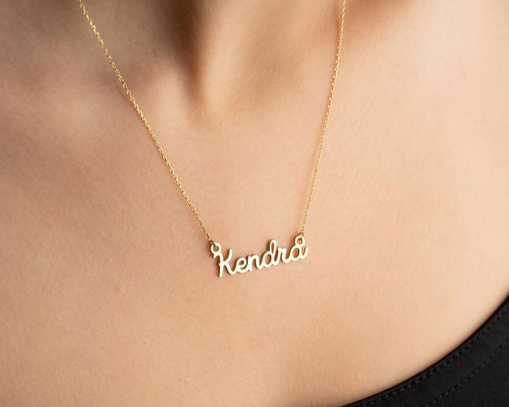 *  Customizable Nameplate - Get your own unique nameplate necklace crafted from 14K solid gold! Perfect gift for her, this piece will be a timeless accessory for your loved ones. Wear your name with pride! *  Adjustable Length - Customize your 14K solid gold name necklace to the perfect length! Perfect summer jewelry to show off your style. *  Free shipping - Get your stunning gold name necklaces with free shipping! Shop now and don't miss this amazing deal! *  Gold Namplate - Upgrade your wardrobe with this personalized 14K gold nameplate necklace! Perfect for any special occasion, an ideal gift for the special woman in your life. Show her you care with a personalized piece of jewelry that lasts a lifetime. #GiftsForWoman *  Gold solid - 14K Solid Gold Name Necklace - the perfect blend of Birthday Nameplate Necklace, Gold Name Necklace For Birthday, Custom Nameplate Necklace For Birthday Gift, Custom Nameplate Necklace For Birthday, 14k Gold Name Necklace For Birthday, 14k Gold Nameplate Necklace For Birthday, Yellow Gold Nameplate Necklace For Birthday, Nameplate Name Necklace For Birthday Gift, Nameplate Name Necklace For Birthday