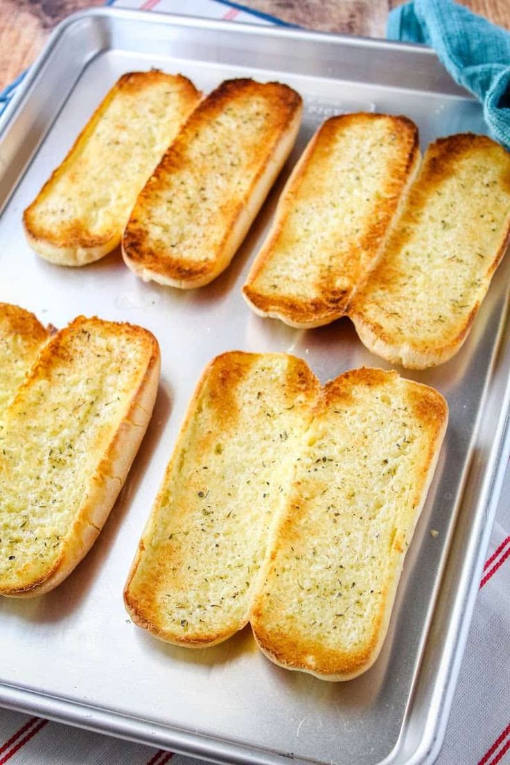 six slices of bread on a baking sheet