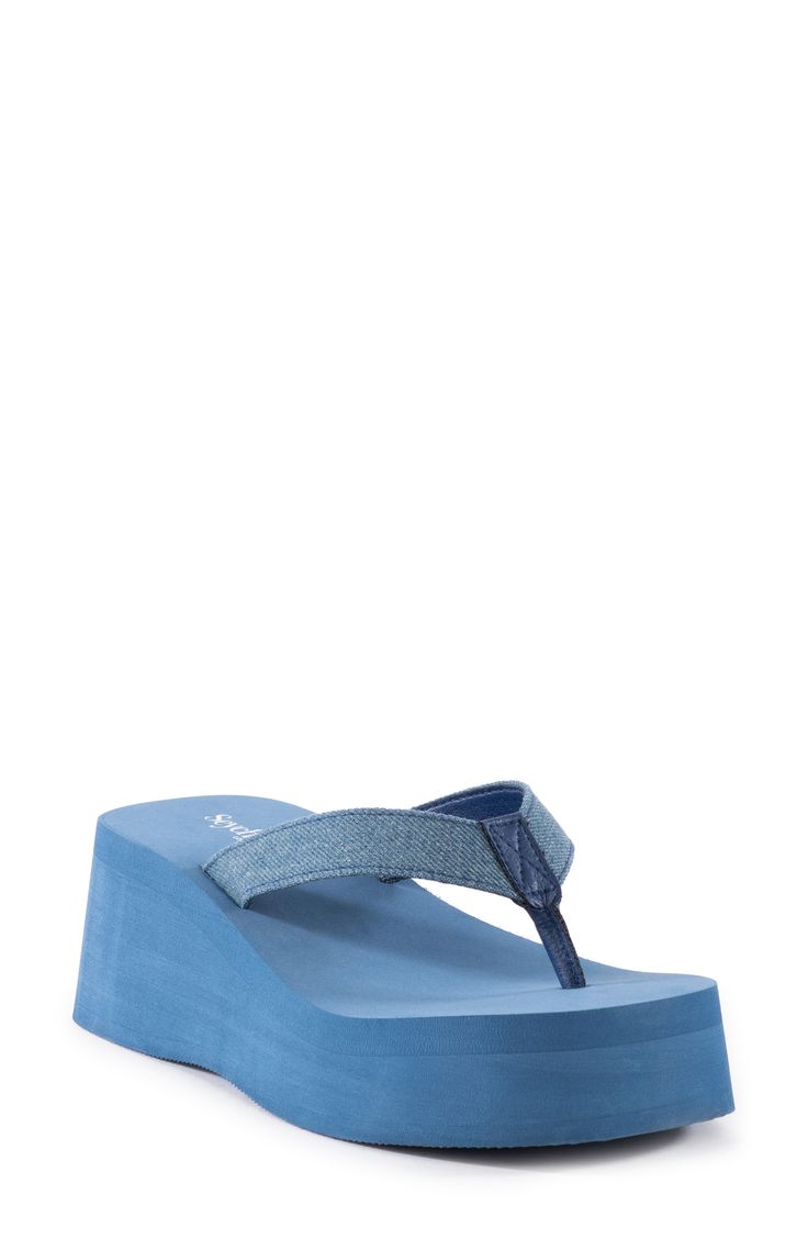 Wide straps and a cushioned footbed bring breezy comfort to this on-trend flip-flop set on a chunky platform. 2 1/4" heel; 1 1/2" platform Textile or synthetic upper/synthetic lining and sole Imported Synthetic Toe Post Platform Slippers With Textured Footbed, Platform Toe Post Synthetic Flip Flops, Spring Pool Sandals With Synthetic Material, Summer Foam Flip Flops With Round Toe, Casual Blue Platform Slippers For Summer, Blue Synthetic Platform Slippers For Summer, Beach Season Synthetic Platform Slippers, Summer Open Toe Foam Flip Flops, Synthetic Round Toe Flip Flops For Pool