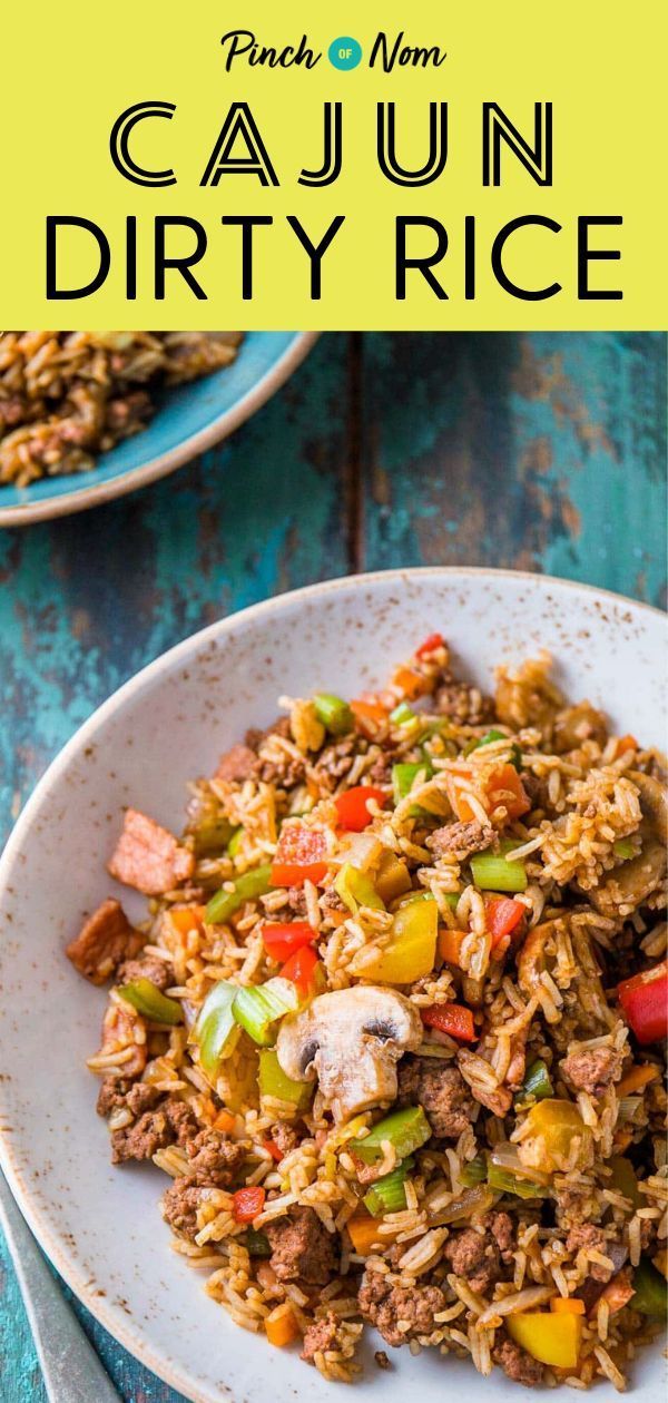 a plate full of rice and vegetables with the title overlay that reads easy mom cajun dirty rice