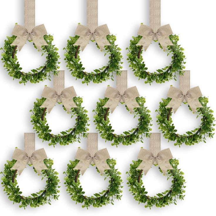 a set of six wreaths with bows