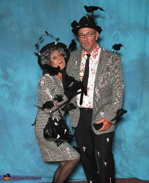 a man and woman dressed up in costumes